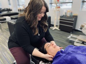 Your top chiropractor in Columbus adjusting a patient